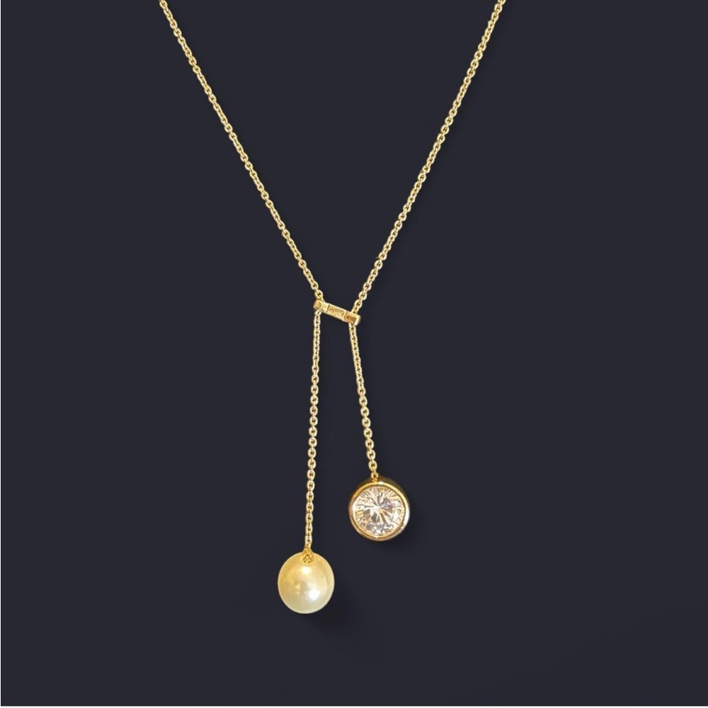Banana republic gold necklace with a dangling faux pearl and gemstone Minimalist